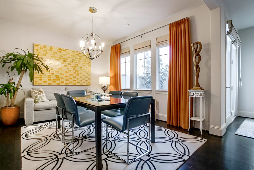 Dining room with coral curtains