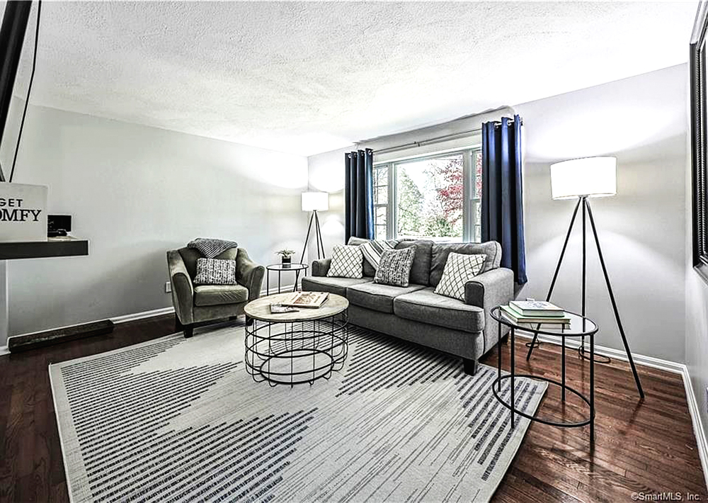 Gray-couch-with-navy blue curtains