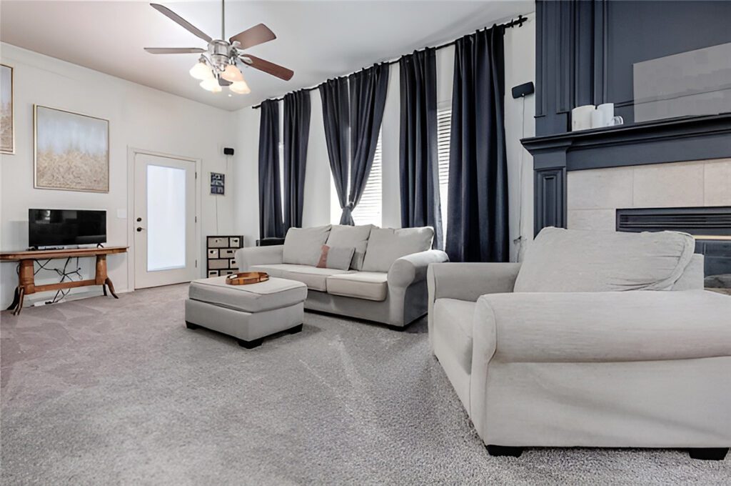 Living-Rooms-Black Drapes in a Cozy White Haven